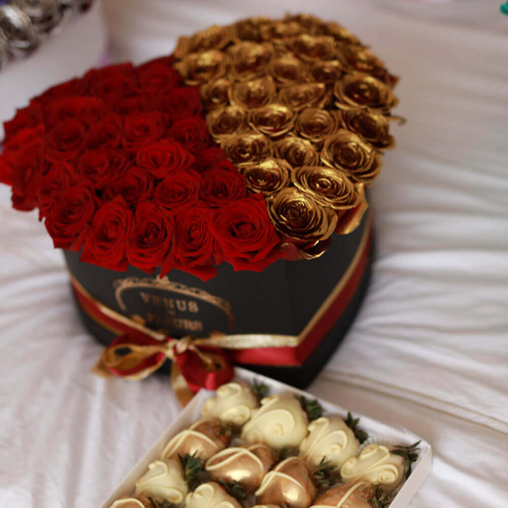 65 красно-золотых роз (сердце)