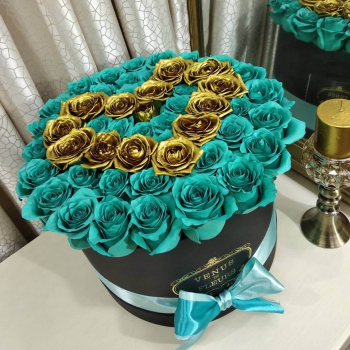 51 бирюзовая роза с золотым сердцем