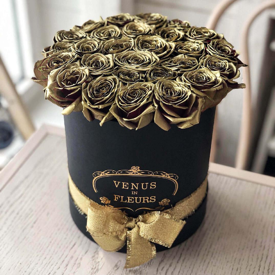 15 золотых роз в коробке