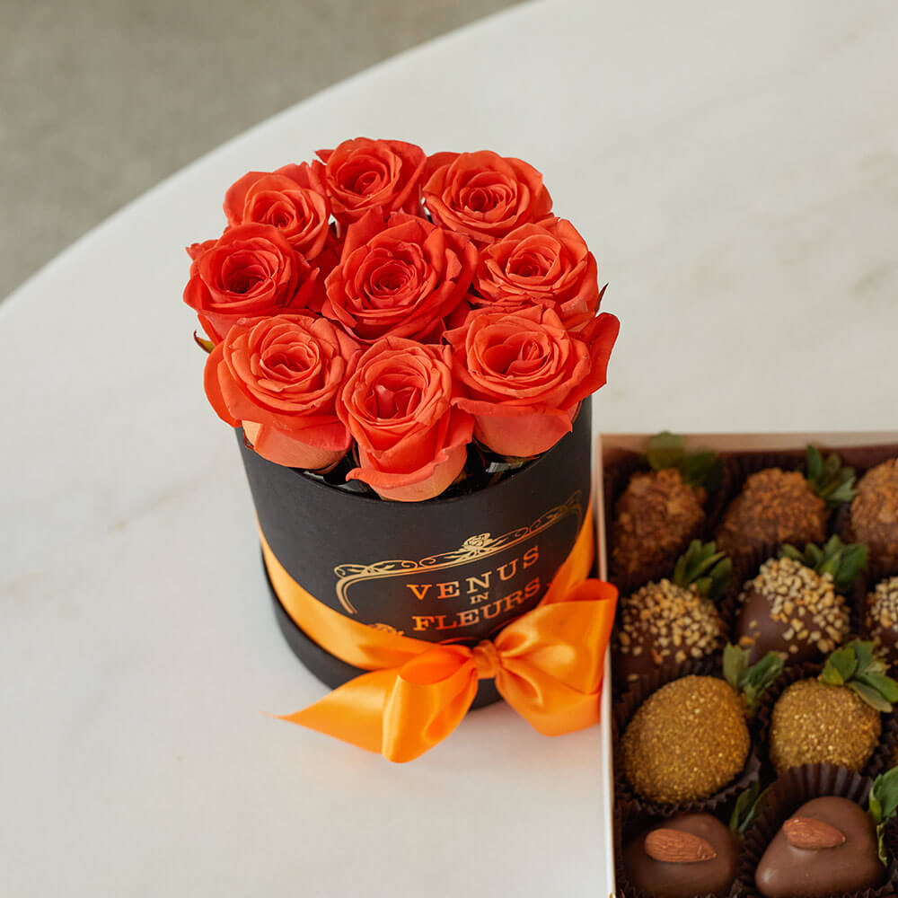 13 коралловых роз в коробке