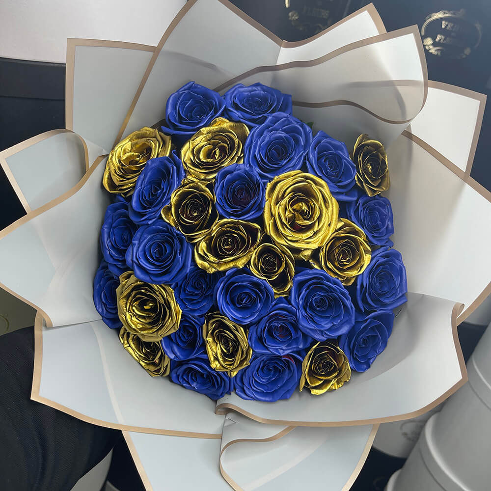 29 сине-золотых роз в букете