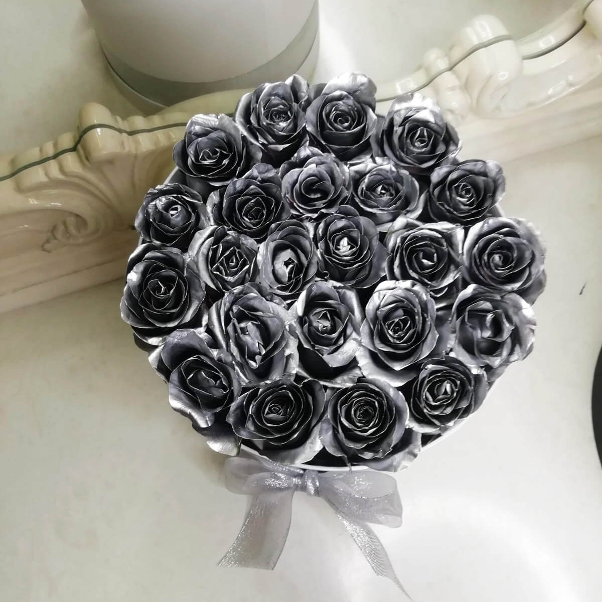 21 серебряная роза в коробке