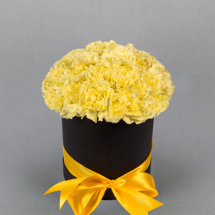 29 желтых гвоздик в коробке