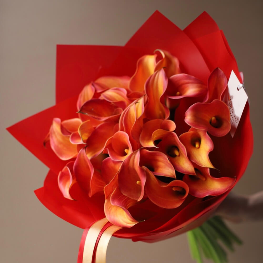 29 оранжевых калл в букете