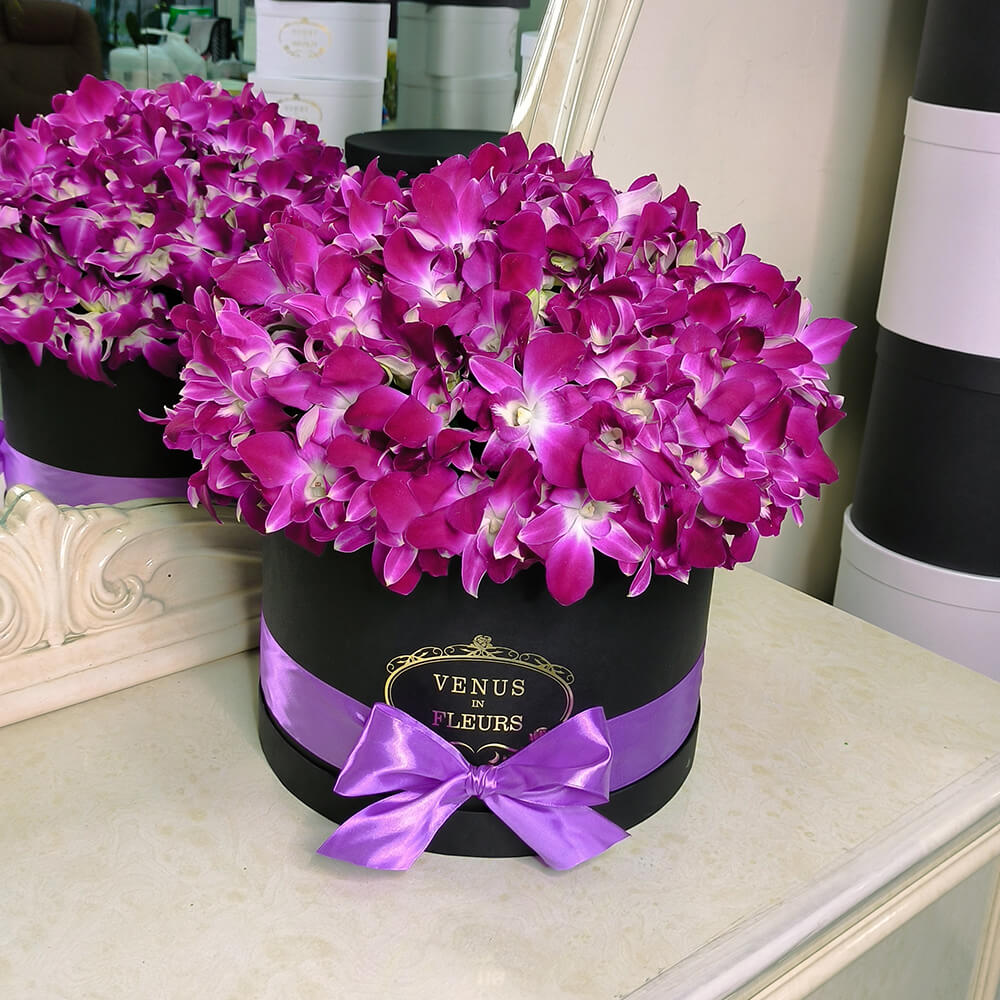Розовые орхидеи в коробке от 29 шт.